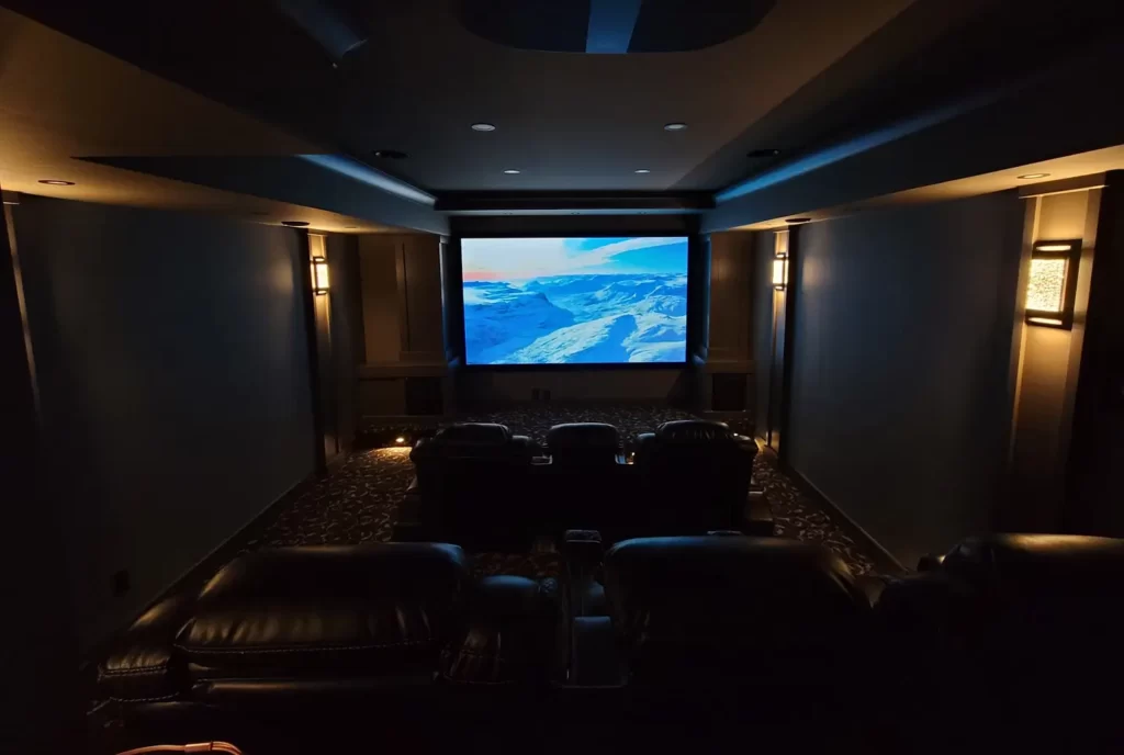 Custom Home Theater Installation with Projector and Surround Sound by Mission Audio Visual