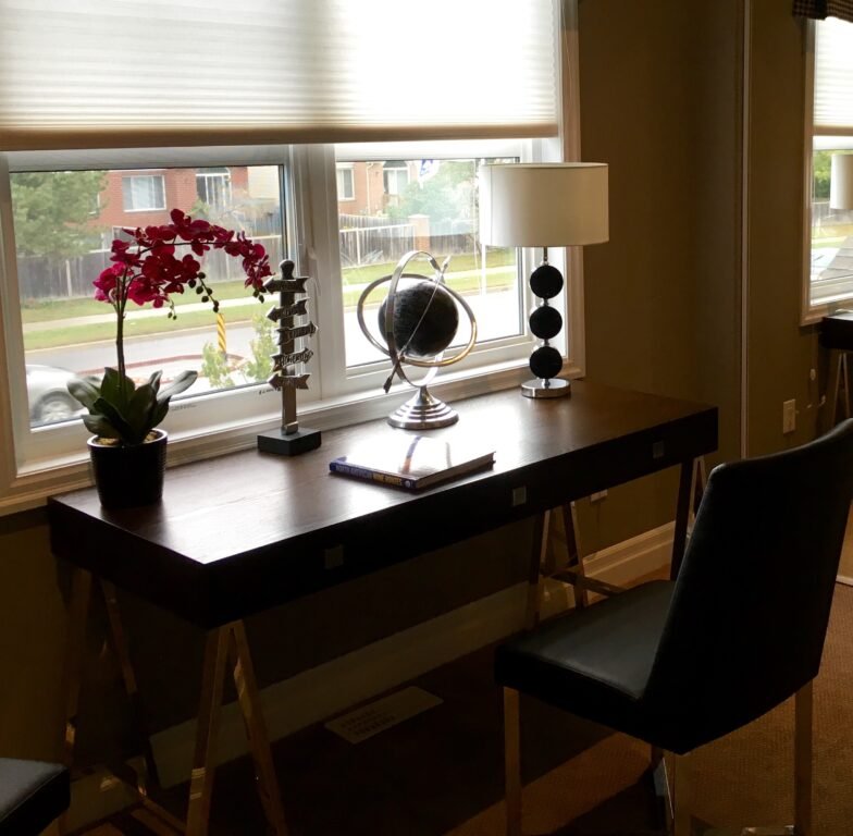 a High Reolution Photo of Automated Shades Inside a Smart Home and Home Office