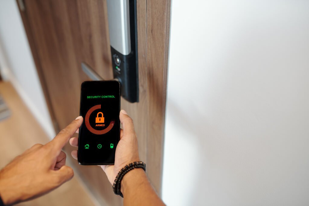 Smart Home Automation - Smart Lock Product Showcases a Smartphone Unlocking a Home